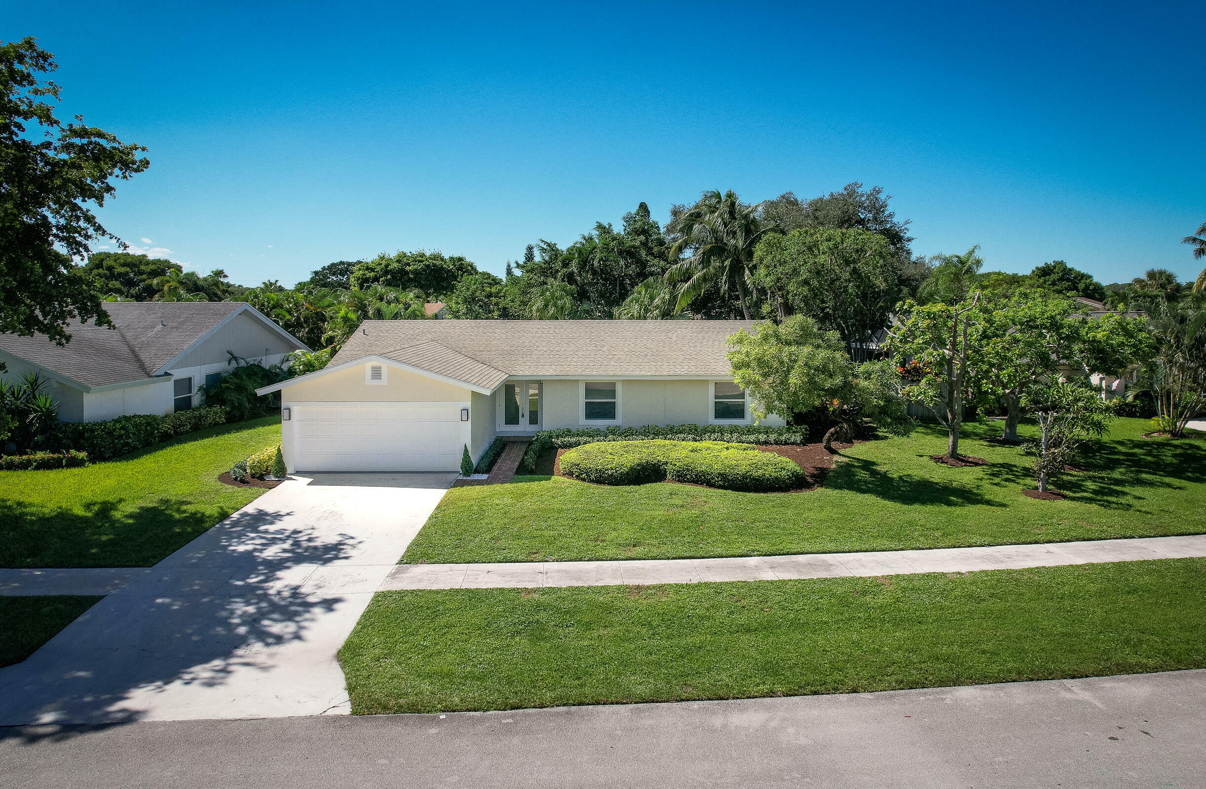 Property Photo:  4126 Birchwood Drive  FL 33487 