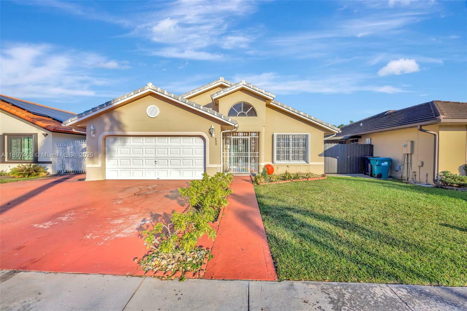 Property Photo: 699 NW 134th Pl FL 33182