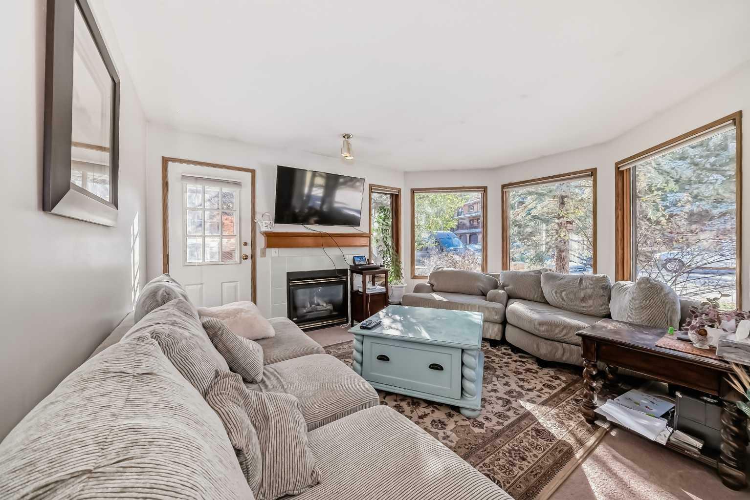 Property Photo:  1030 Rundleview Drive  AB T1W 2P2 