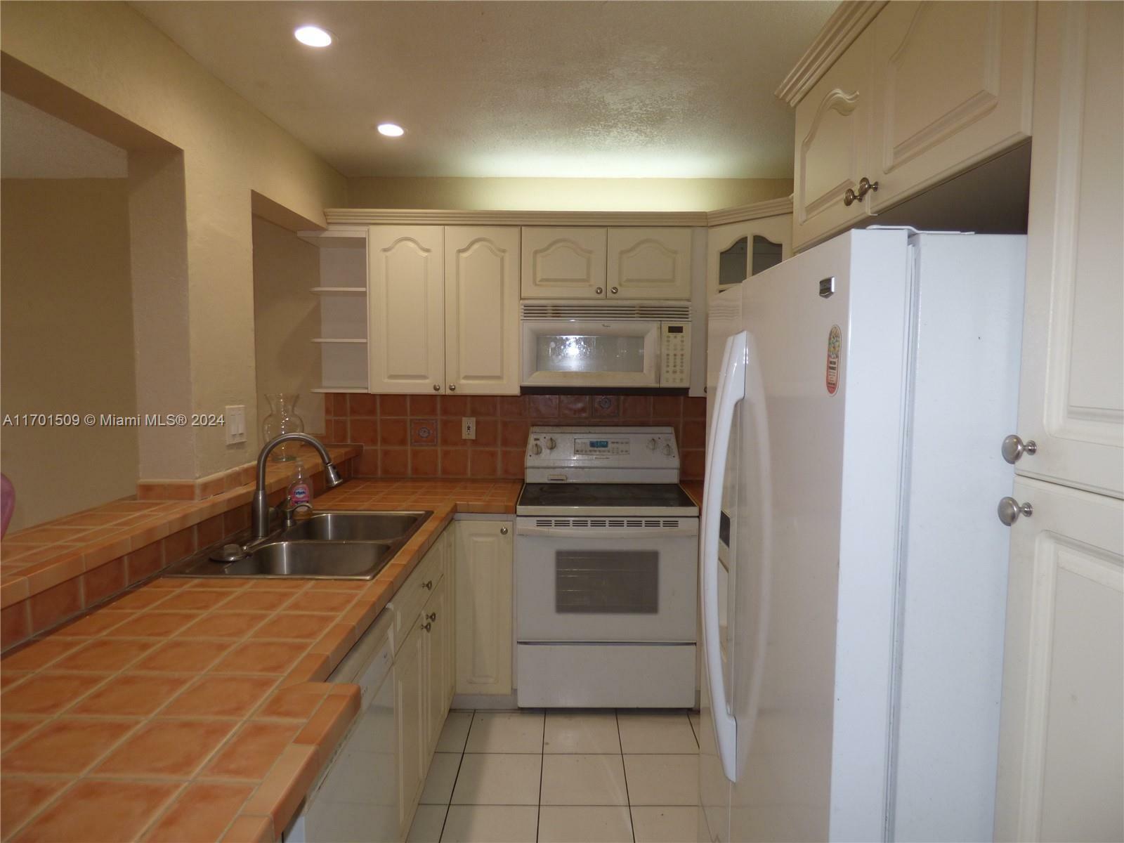 Property Photo:  5625 W 20th Ave 309  FL 33012 