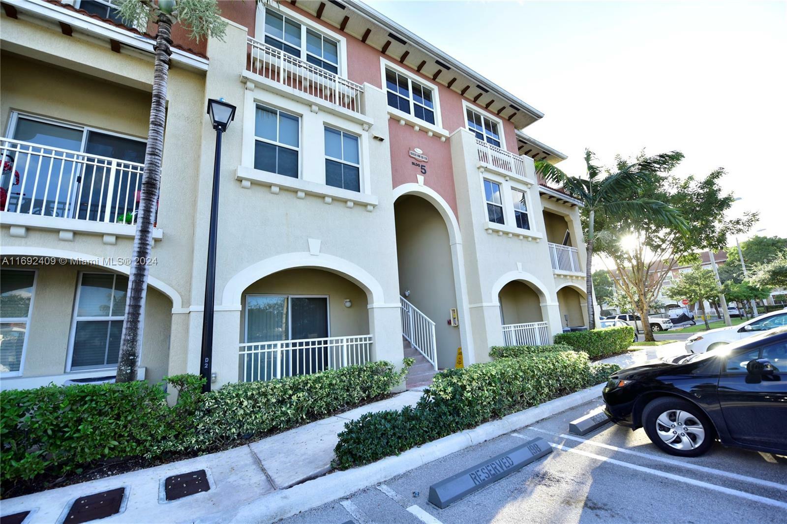 Property Photo:  10850 NW 89th Ter 105-5  FL 33178 