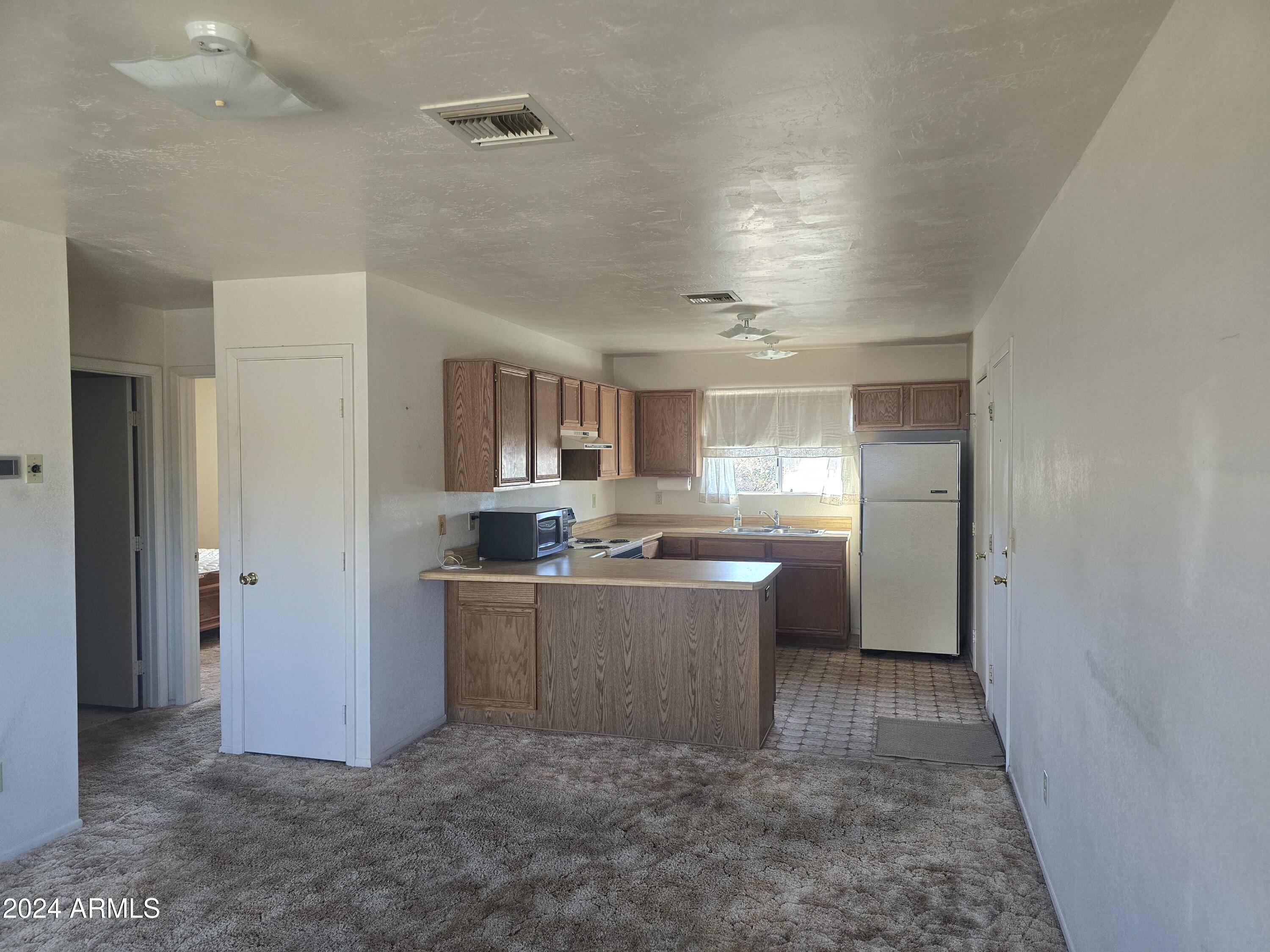 Property Photo:  312 N Madison Street  AZ 85390 