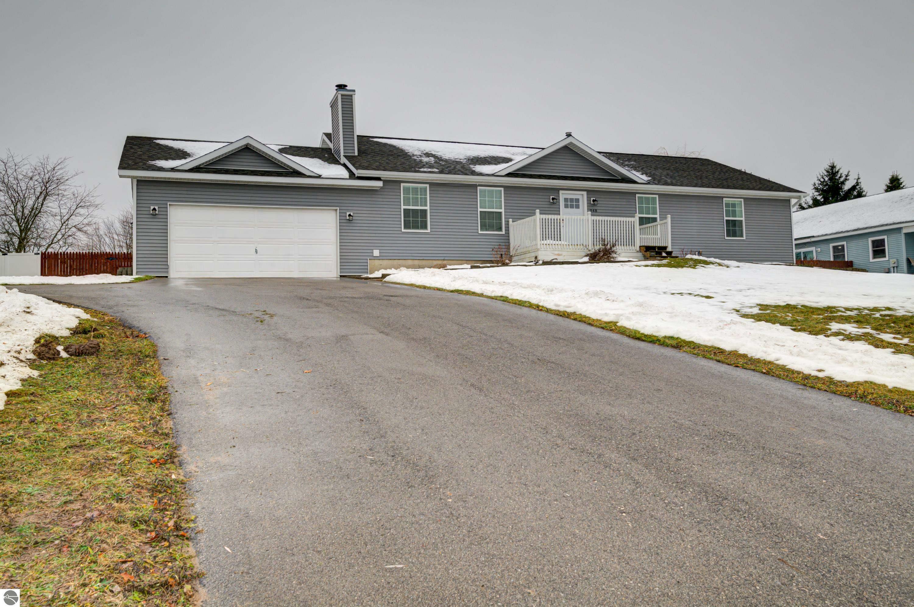 Property Photo:  948 Cherry Ridge Drive  MI 49696 