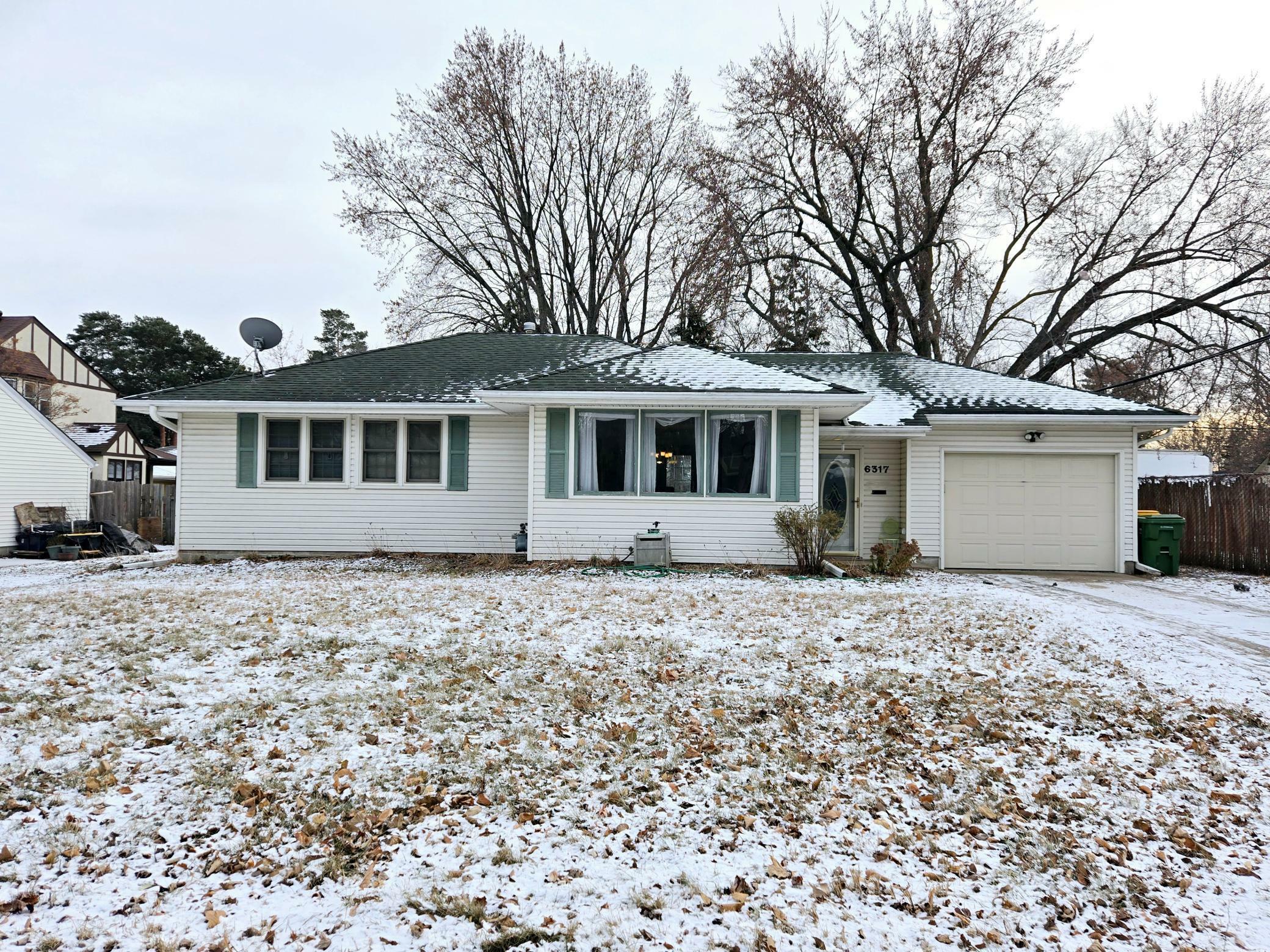 Property Photo:  6317 45th Avenue N  MN 55428 