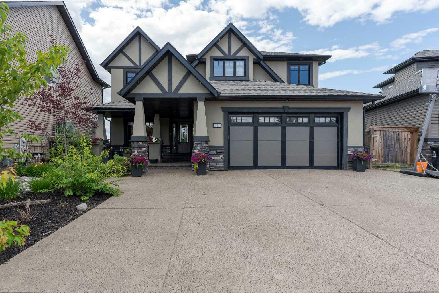 Property Photo: 243 Wild Rose Street AB T9K 0G8