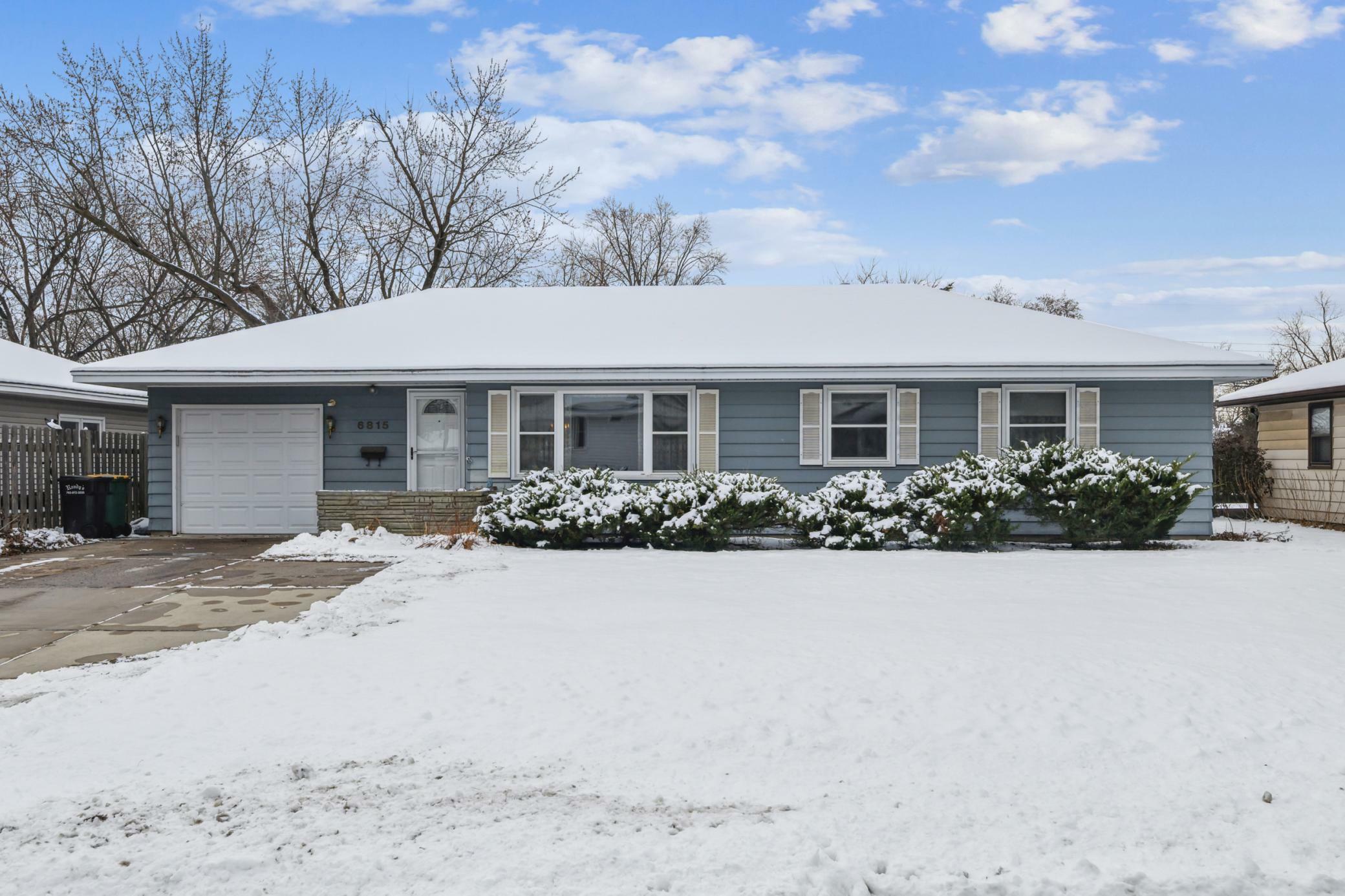 Property Photo:  6815 Dudley Avenue N  MN 55428 