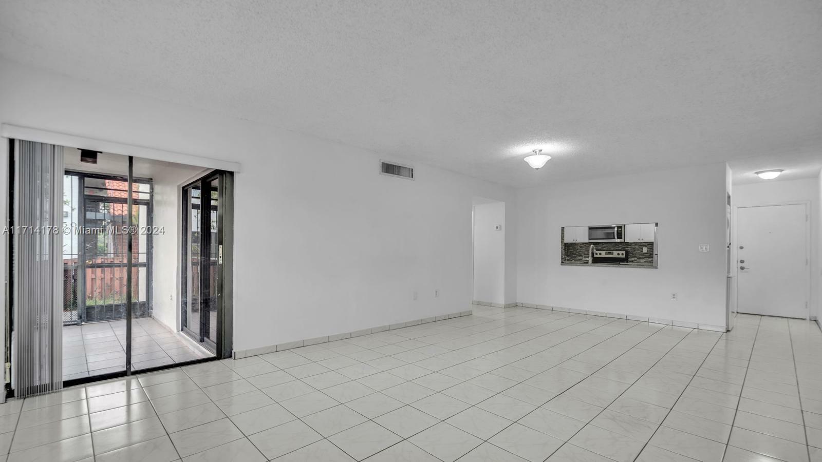 Property Photo:  440 W Park Dr 102-8  FL 33172 