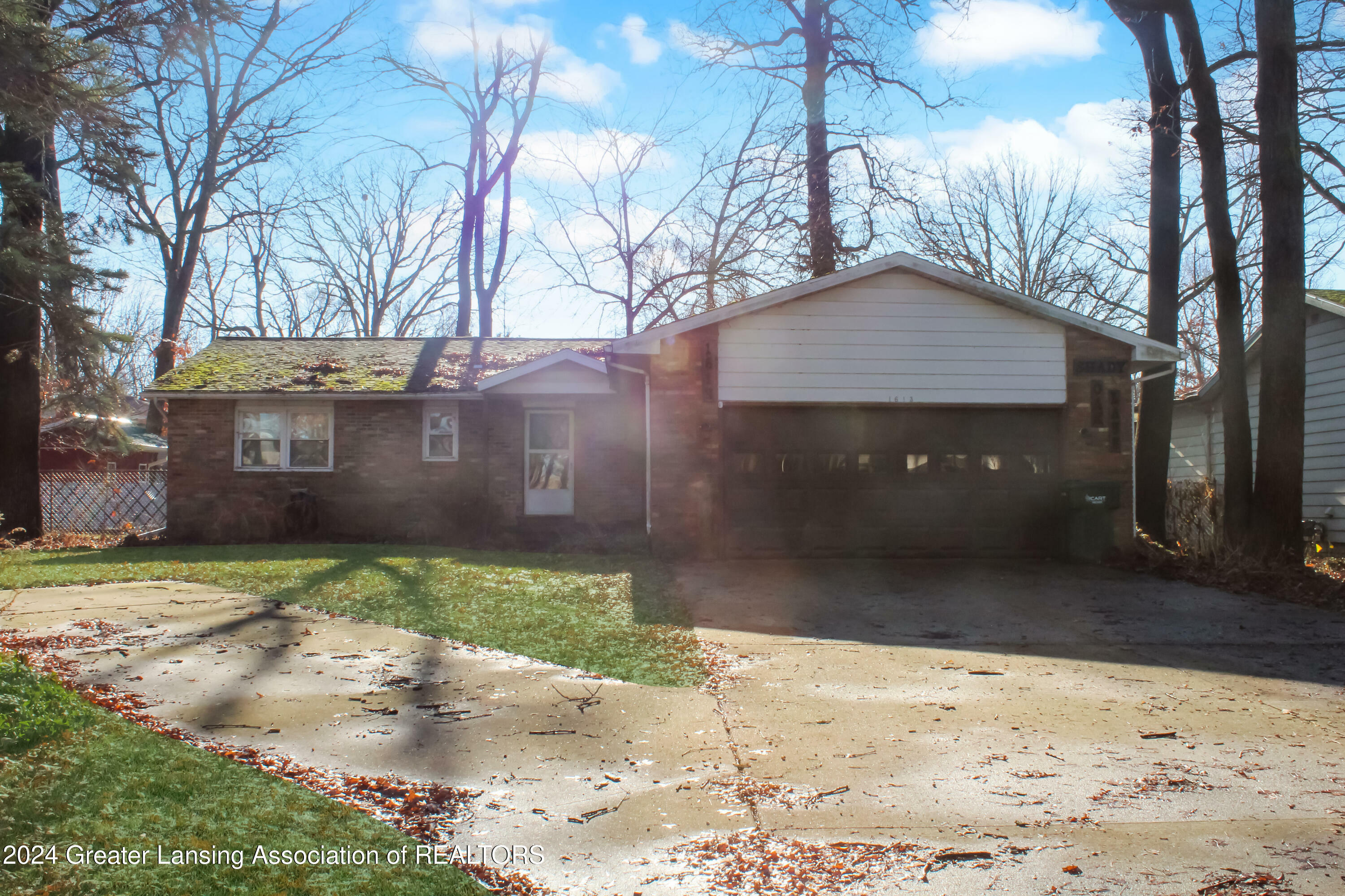 Property Photo:  1613 Shady Oak Lane  MI 48906 