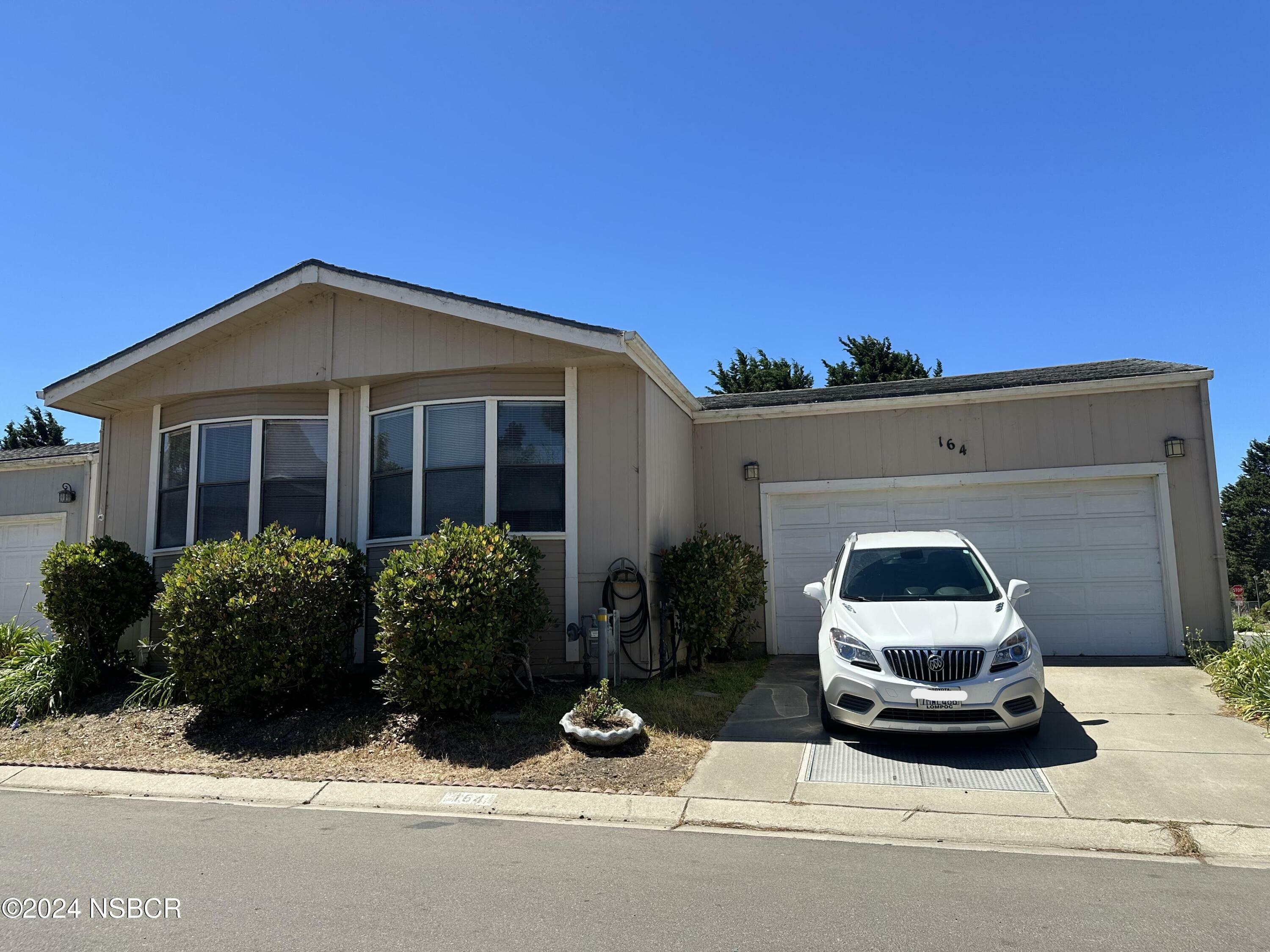 Property Photo: 1317 N V Street 164 CA 93436