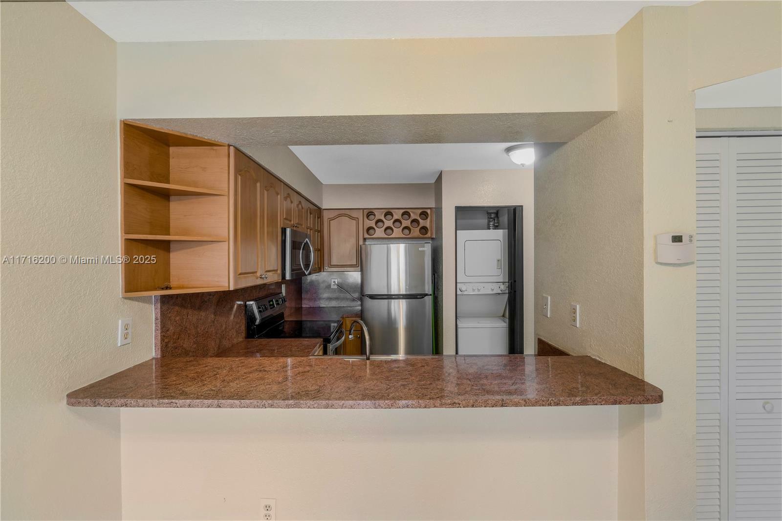 Property Photo:  15545 N Miami Lakeway N 102  FL 33014 