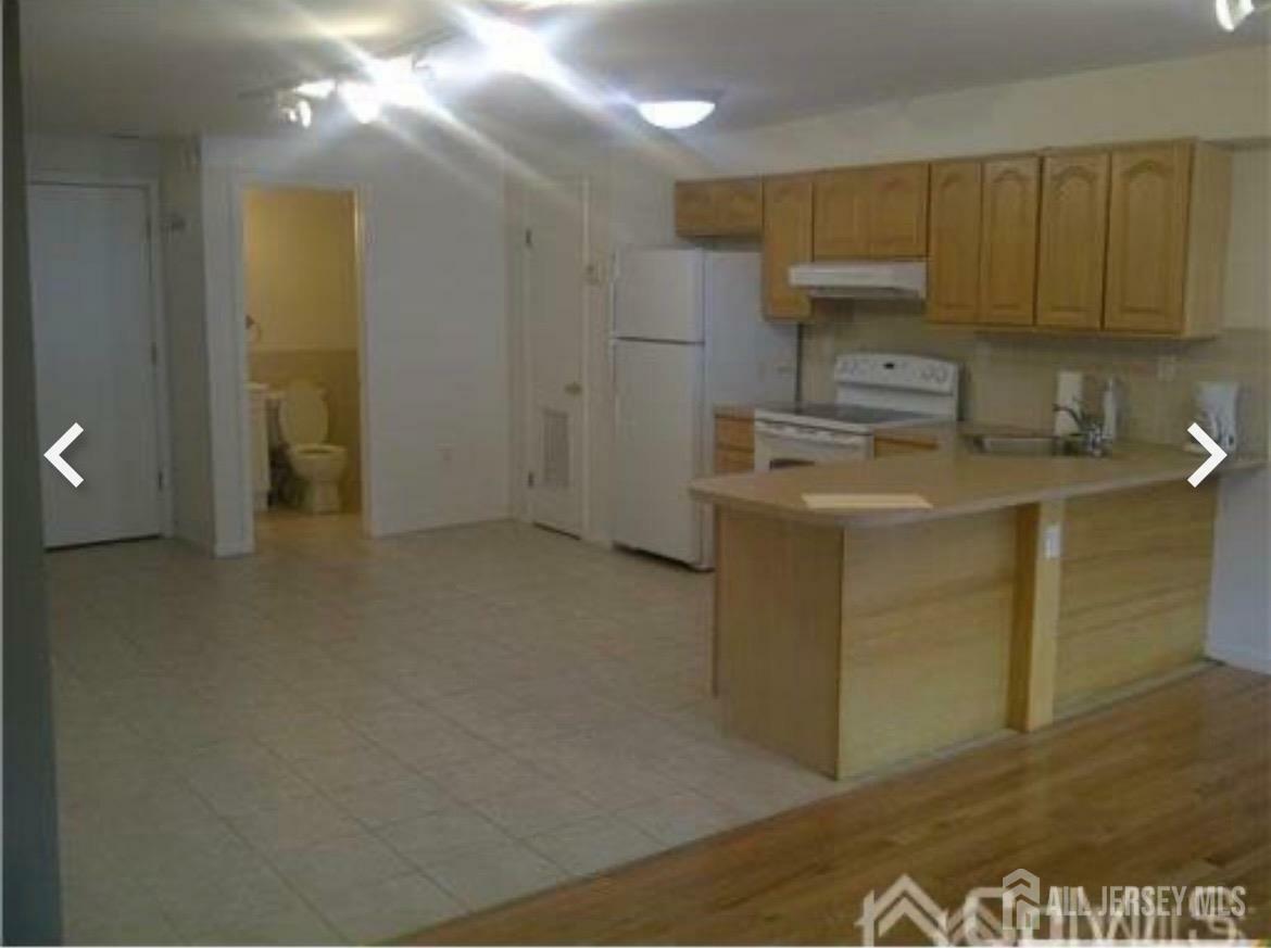 Property Photo:  435 Main Street 2C  NJ 08840 