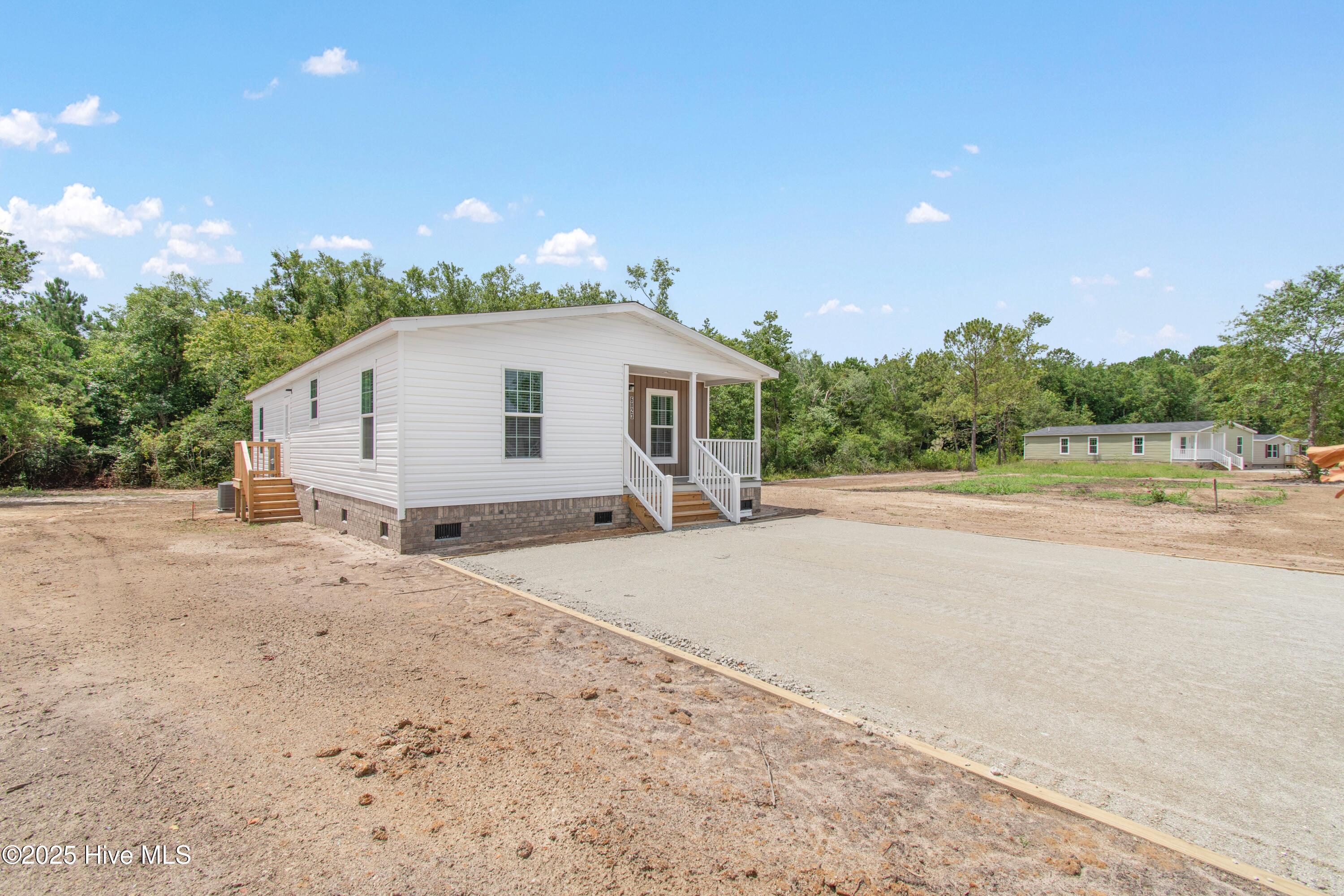 Property Photo:  6823 Lewis Drive SE  NC 28479 