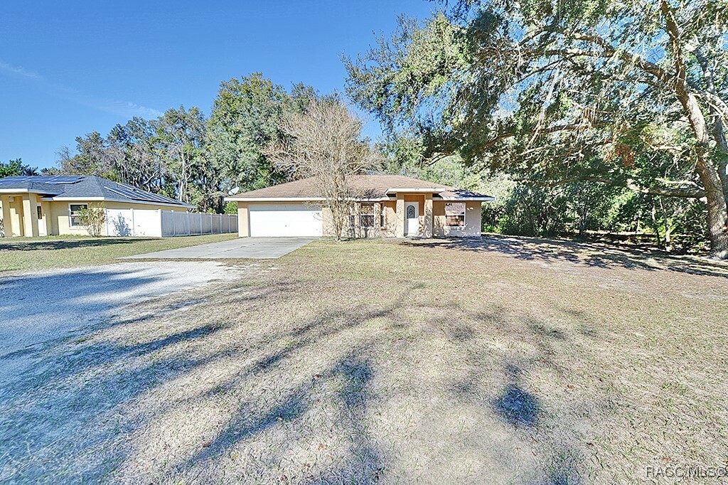 Property Photo:  2406 Ranchland Street  FL 34453 