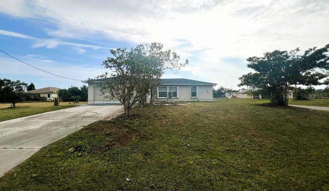 Property Photo:  12143 &Amp 12151 Dubarry Avenue  FL 33981 