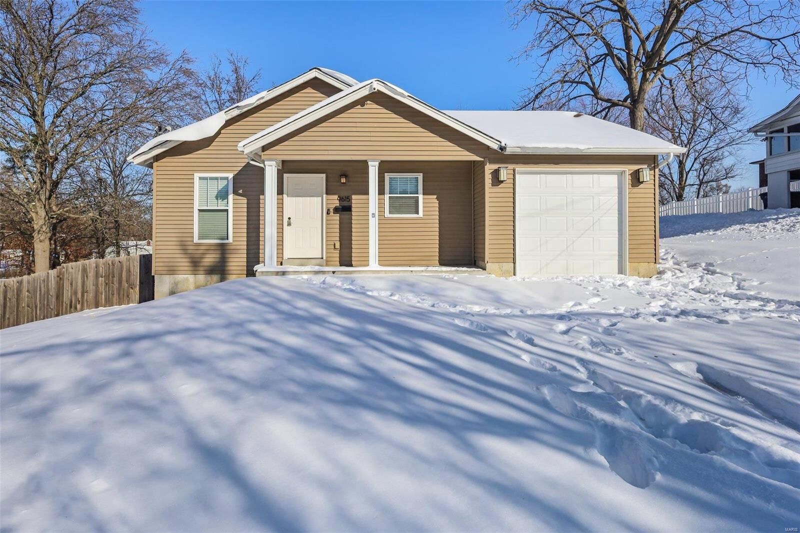 Property Photo:  9615 Tennyson Avenue  MO 63114 