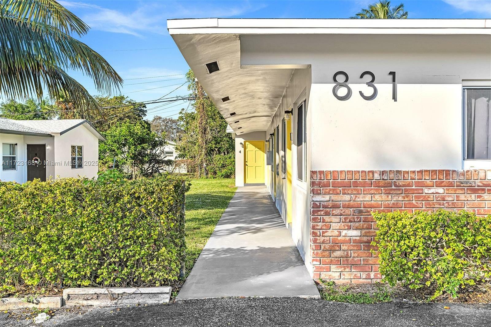 Property Photo:  831 NW 1st Ave  FL 33311 