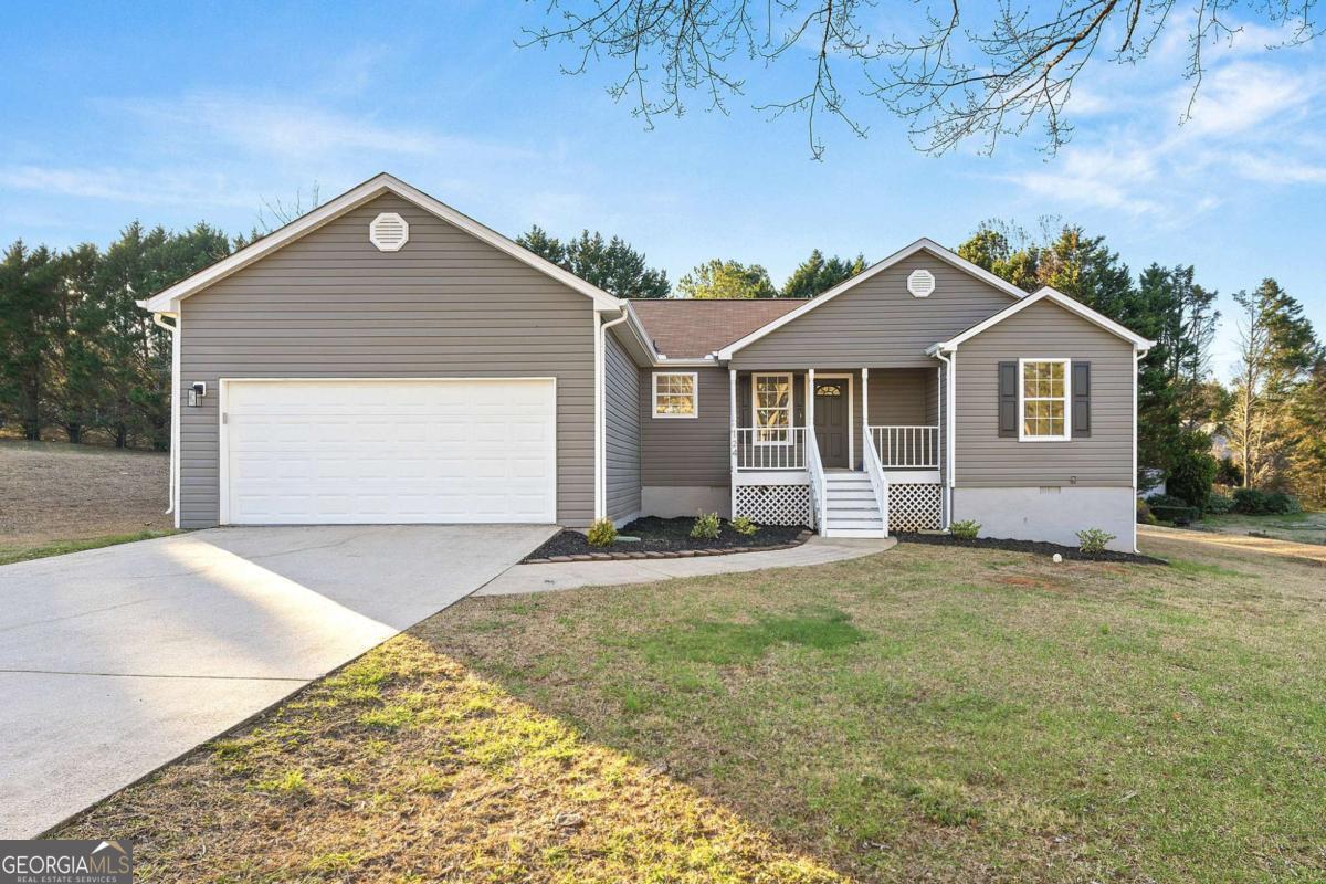 Property Photo: 124 Woodcrest Way GA 30253