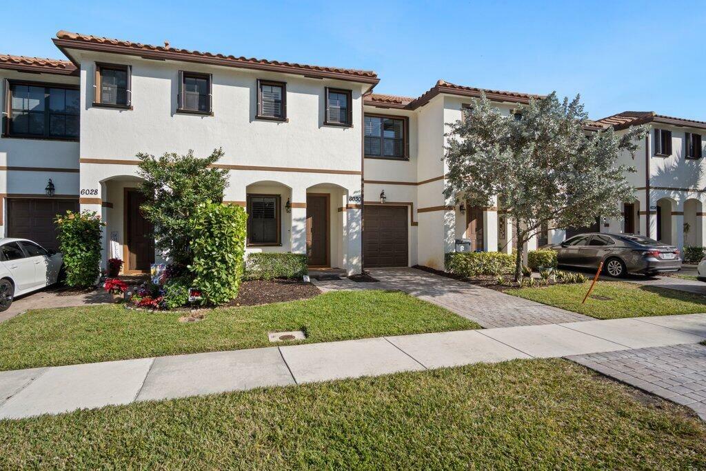 Property Photo:  6030 Bangalow Drive  FL 33463 