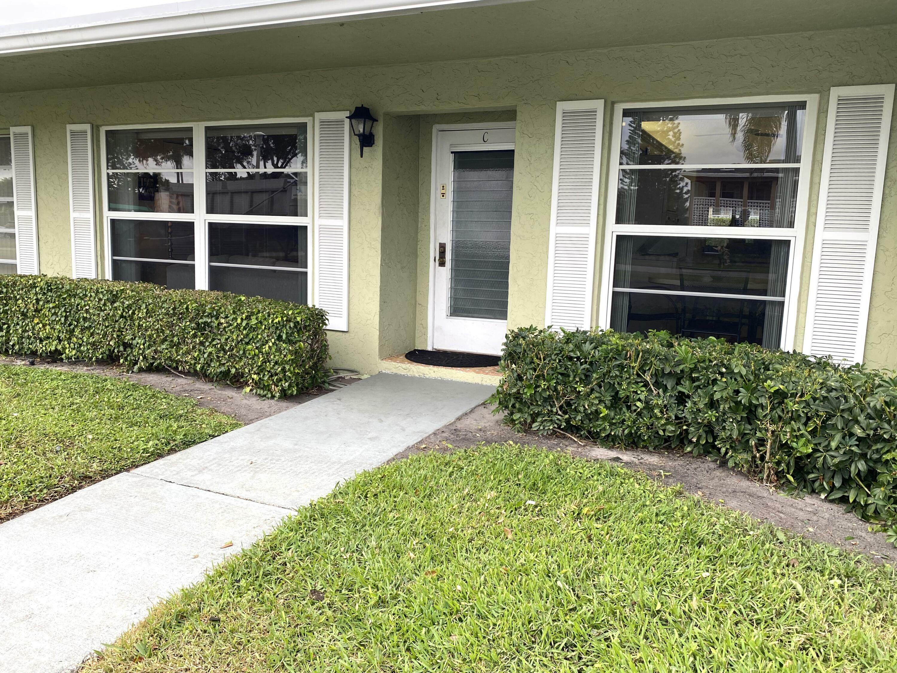 Property Photo:  1141 Boxwood Drive C  FL 33445 