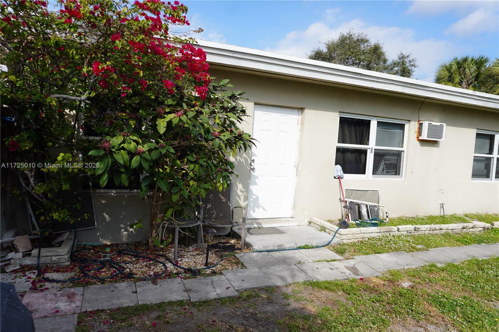 Property Photo:  1608 NW 9th Ave  FL 33311 