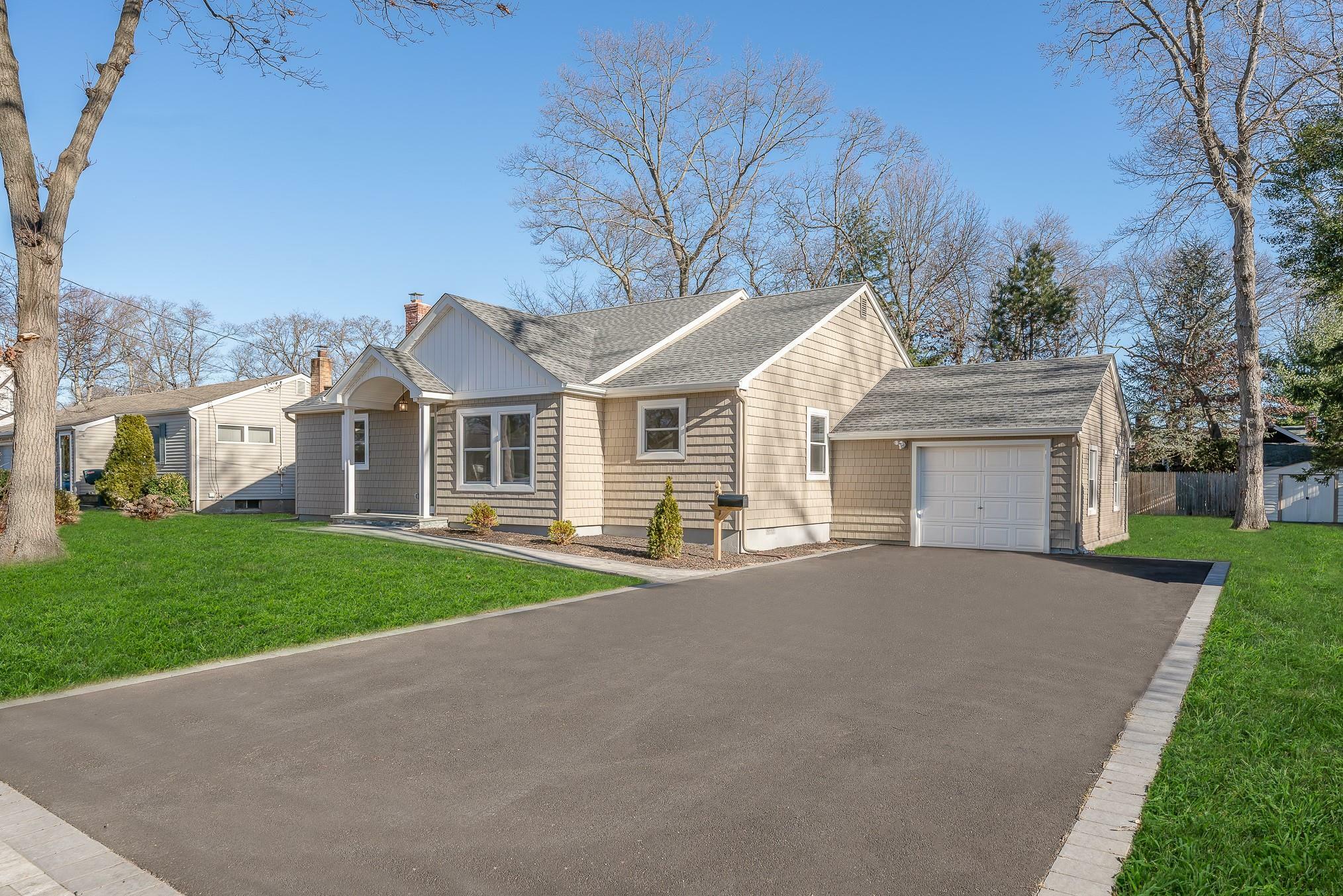 Property Photo:  9 Carrington Drive  NY 11731 