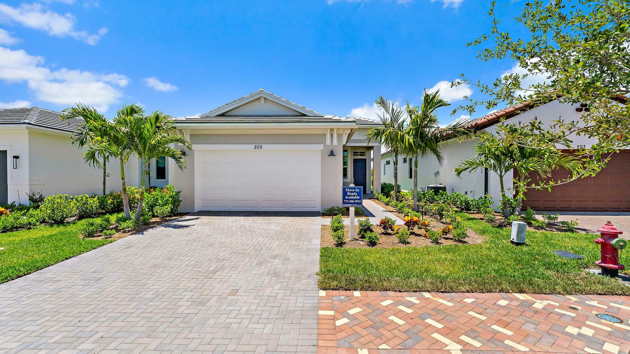 Property Photo: 205 SE Via Sangro FL 34952