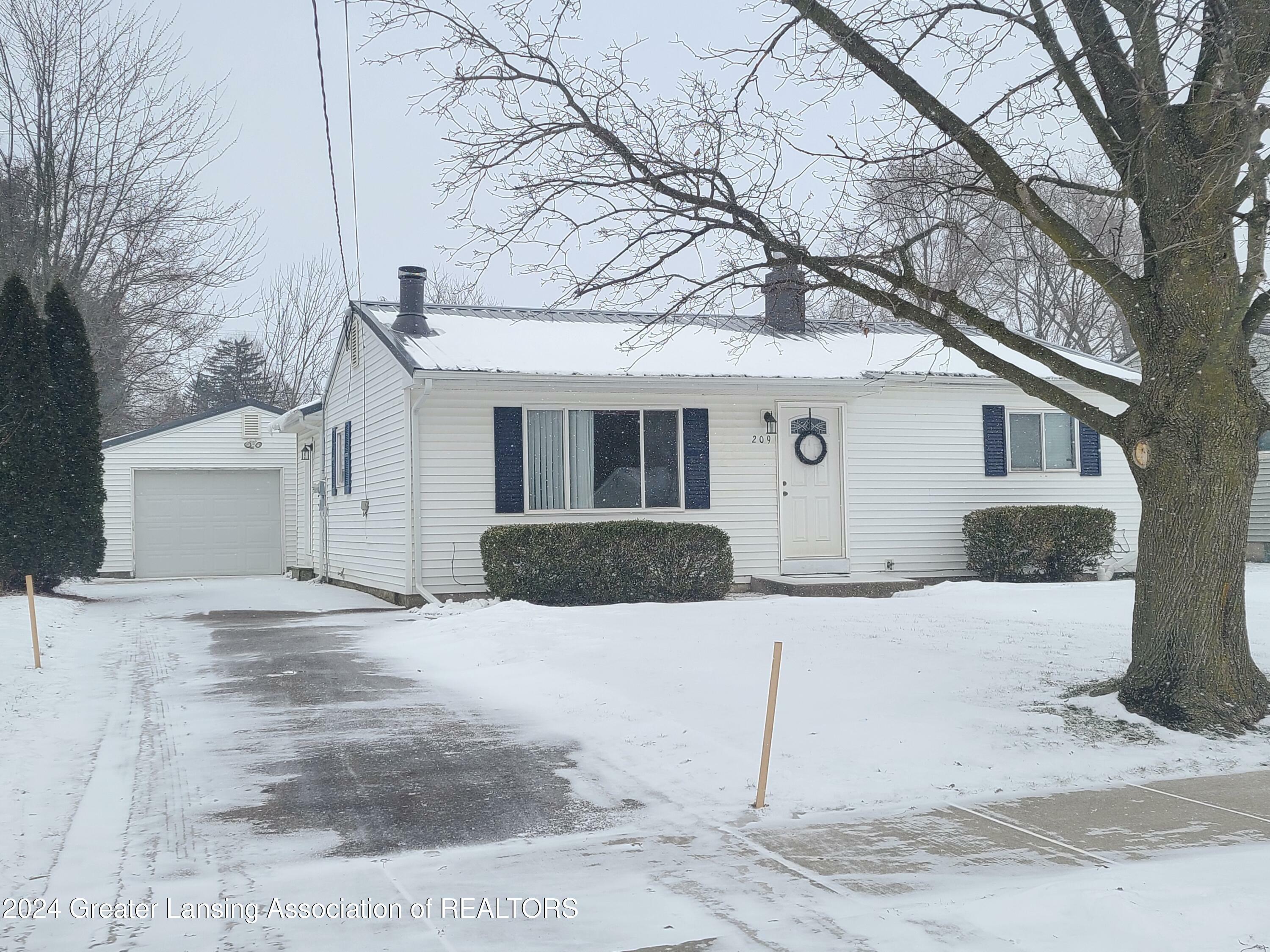 Property Photo:  209 Folk Street  MI 48876 