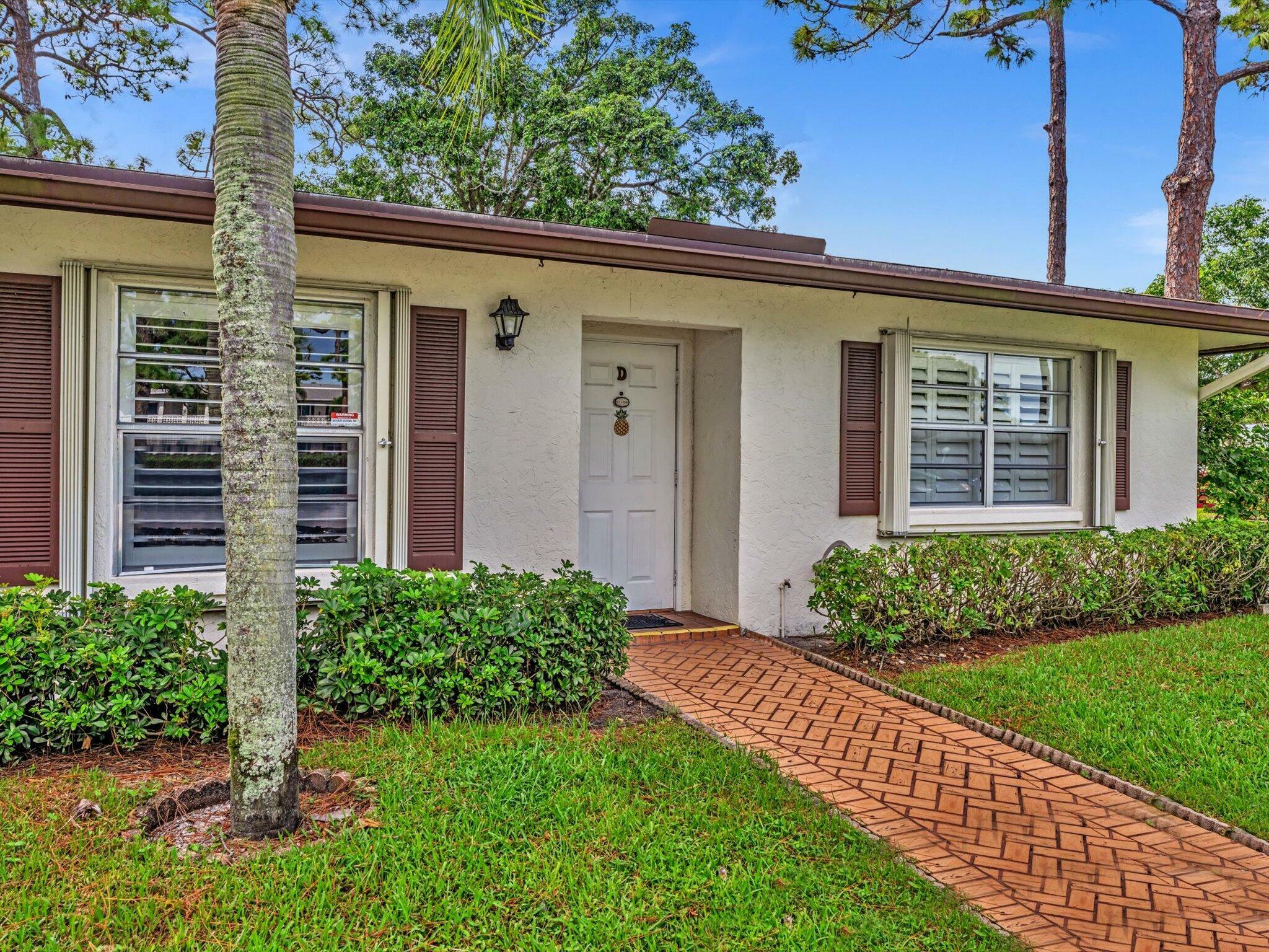 Property Photo: 5400 Poppy Place D FL 33484