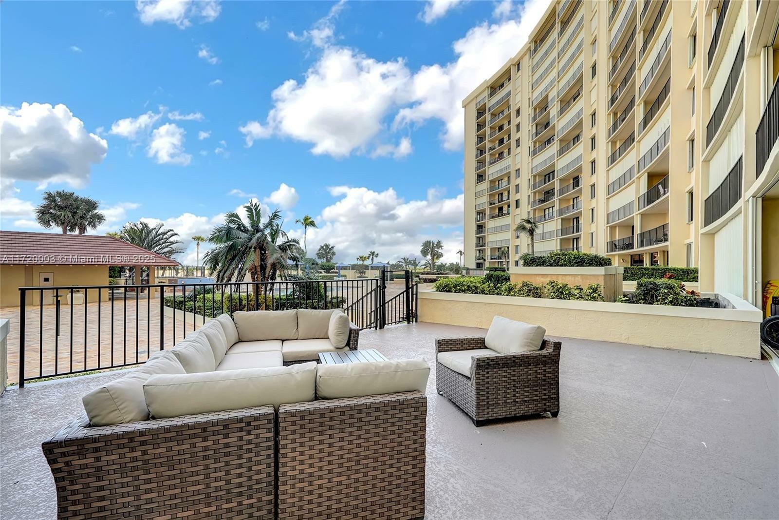 Property Photo:  100 Ocean Trail Way 108  FL 33477 