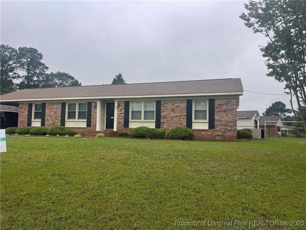 Property Photo:  1202 Castlerock Drive  NC 28305 