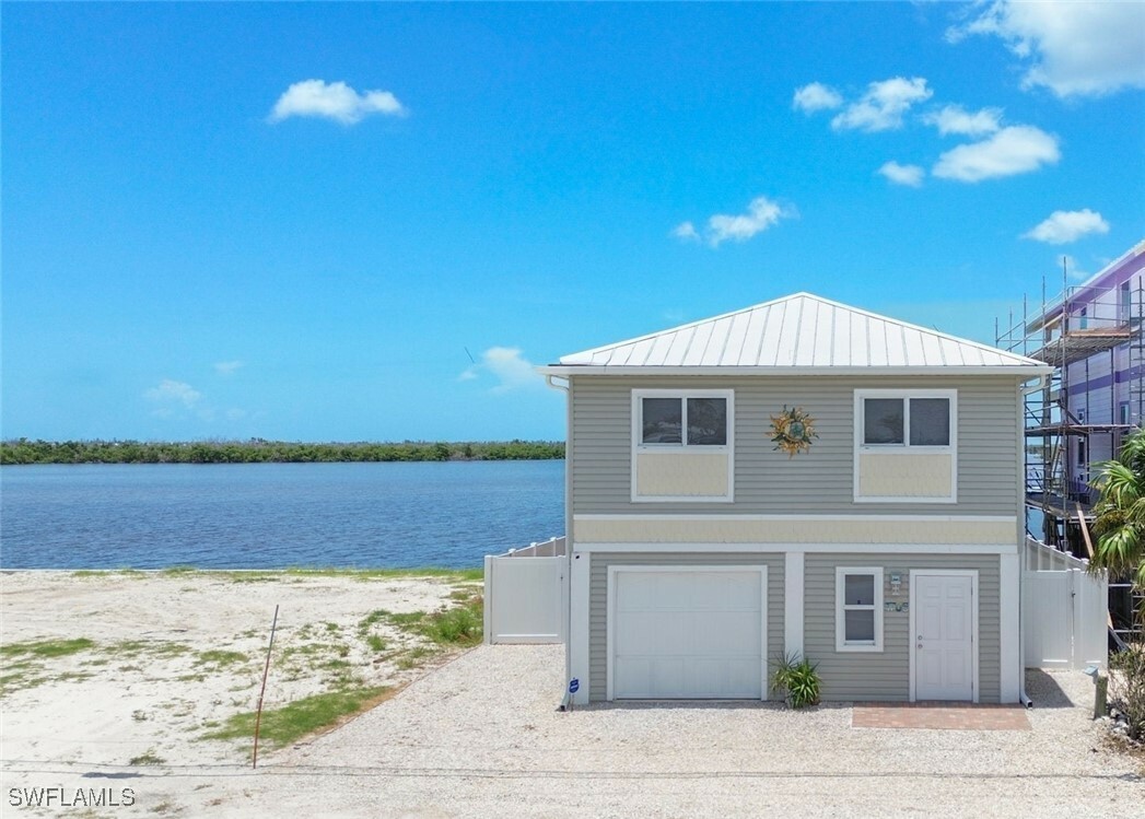 Property Photo: 4706 Pine Island Road NW FL 33993