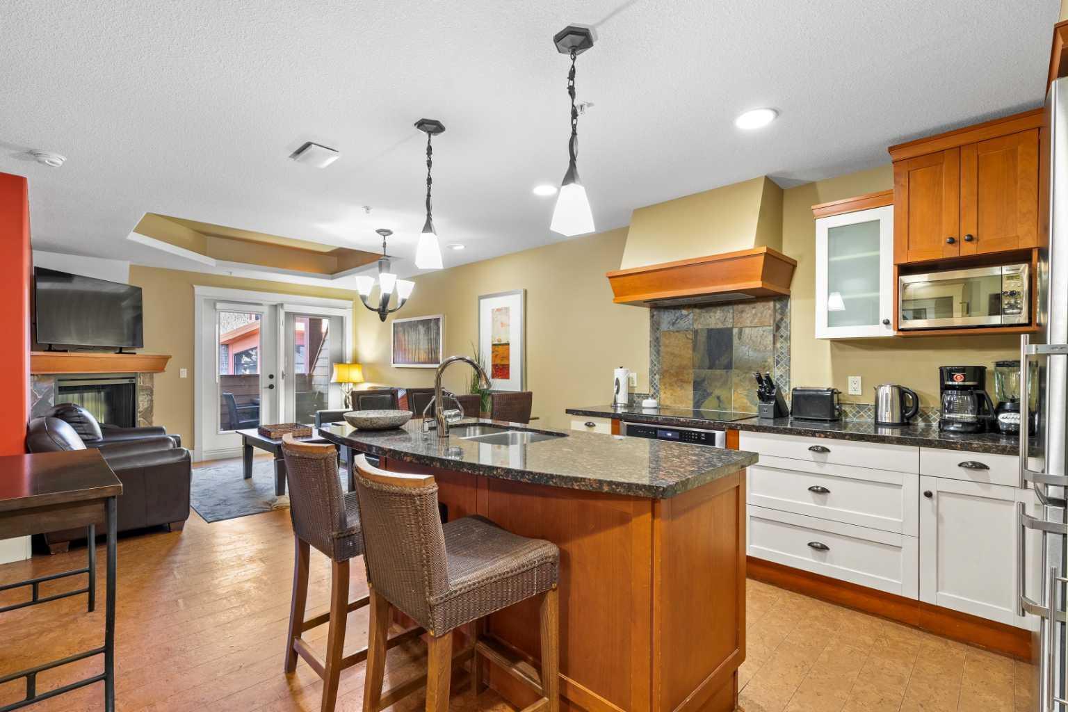 Property Photo: 191 Kananaskis Way 301 AB T1W 0A3