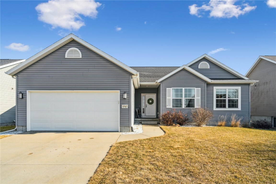 Property Photo:  8702 Grand Oaks Drive NE  IA 52402 