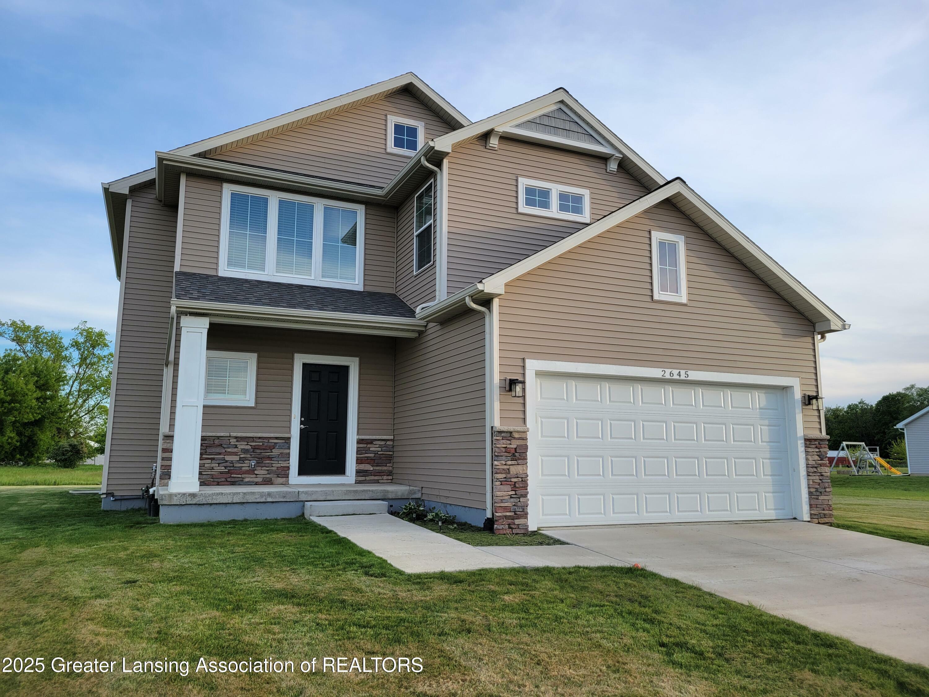 Property Photo: 2645 Boulder Creek Drive MI 48879