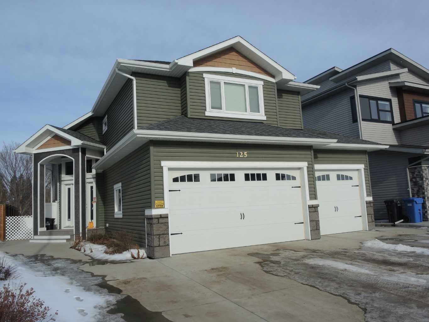 Property Photo:  125 Coachman Way  AB T4M 0B4 