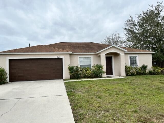 Property Photo:  2625 SW Acco Road  FL 34953 