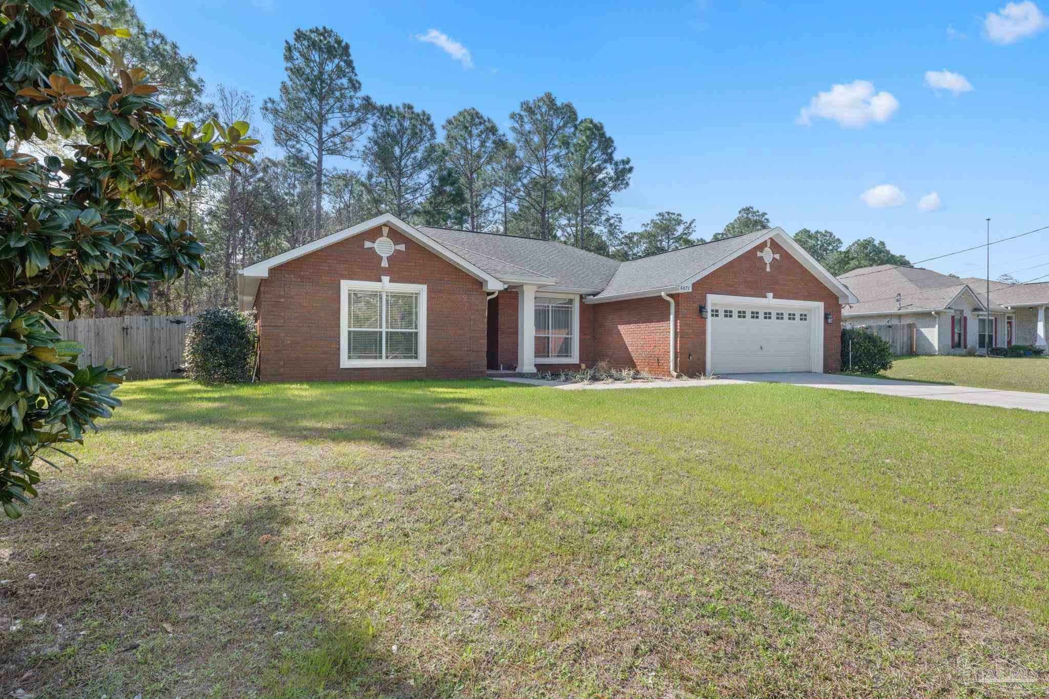 Property Photo:  6673 Redfield St  FL 32566 