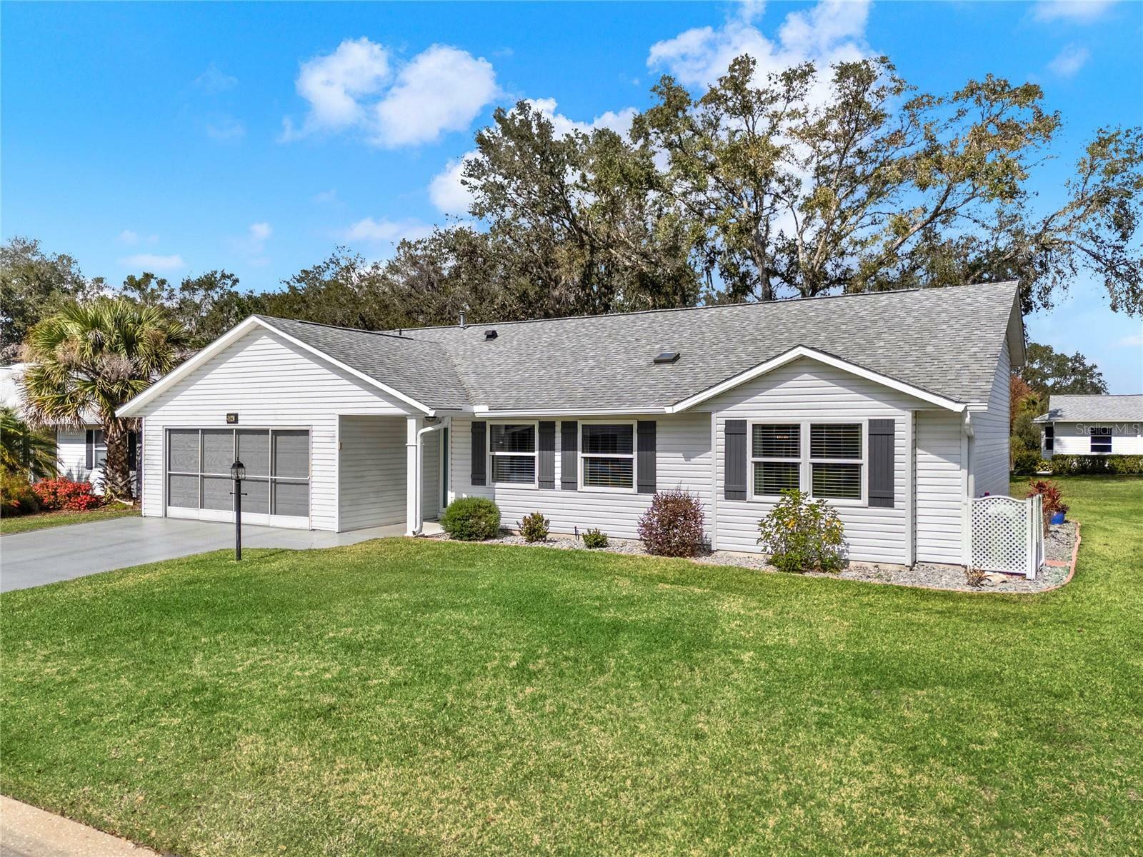 Property Photo:  25941 Newcombe Circle  FL 34748 