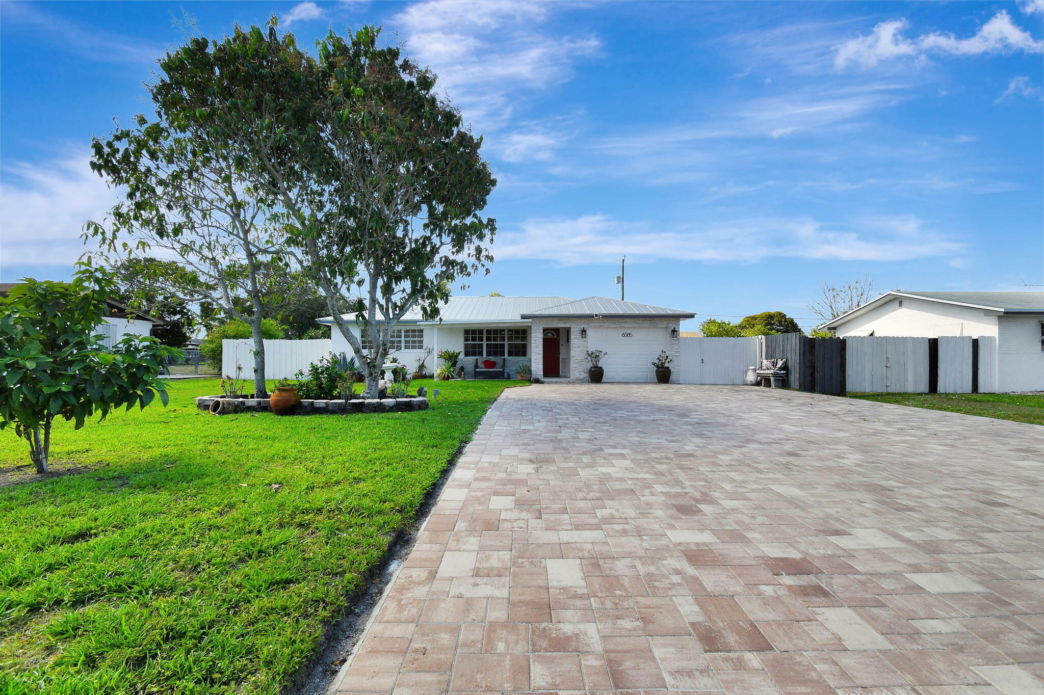 Property Photo:  6585 Osborne Drive  FL 33462 