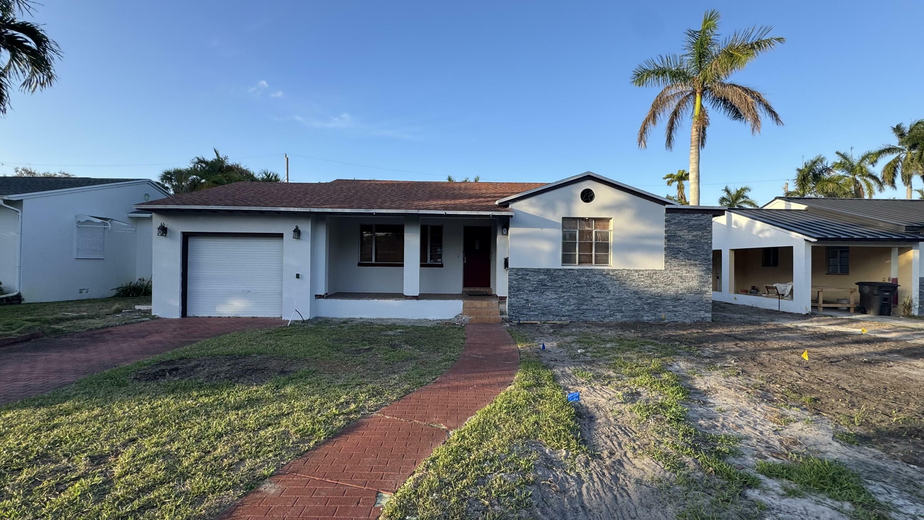 Property Photo:  219 32nd Street  FL 33407 