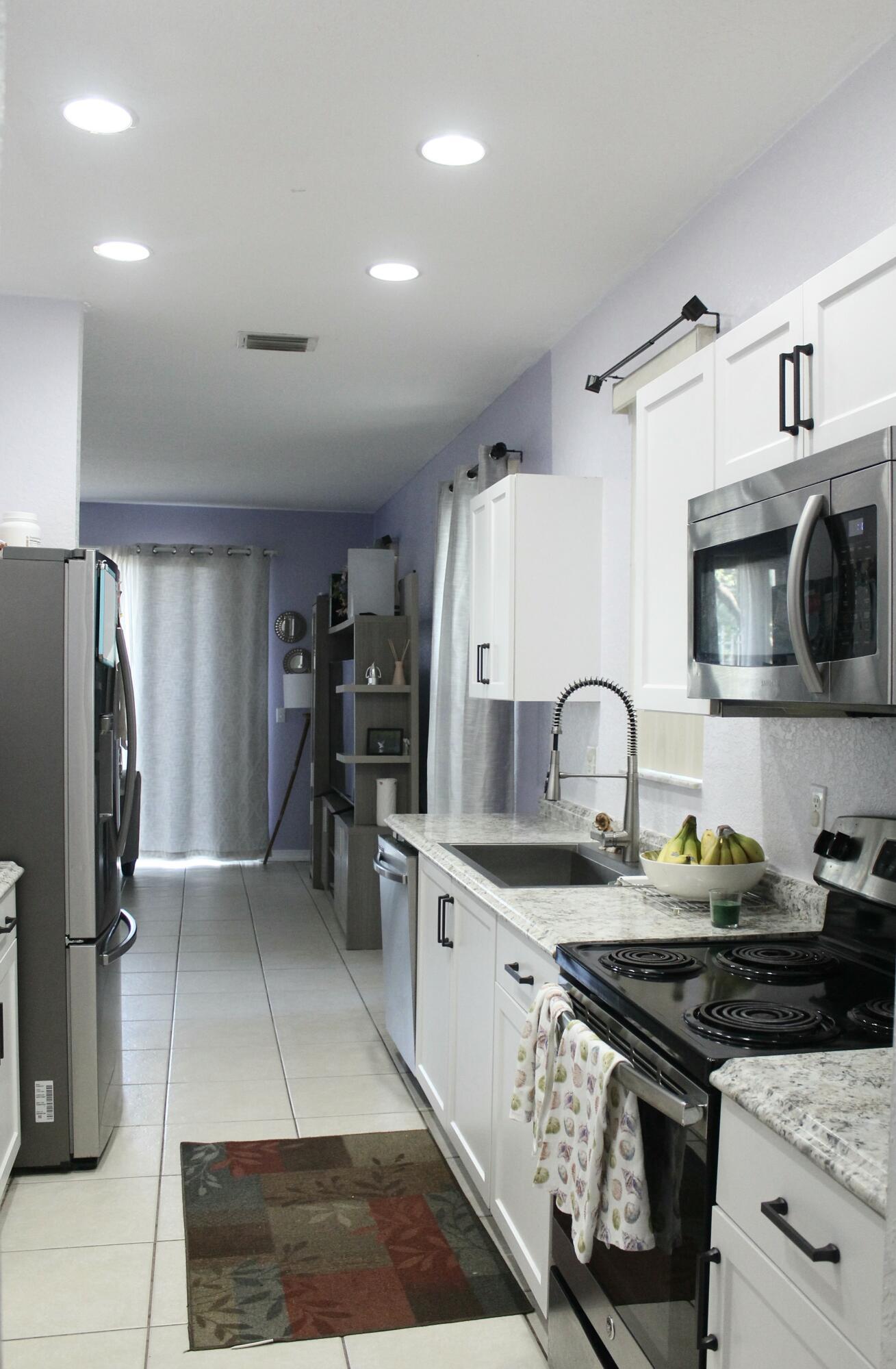 Property Photo: 5210 White Oleander FL 33415