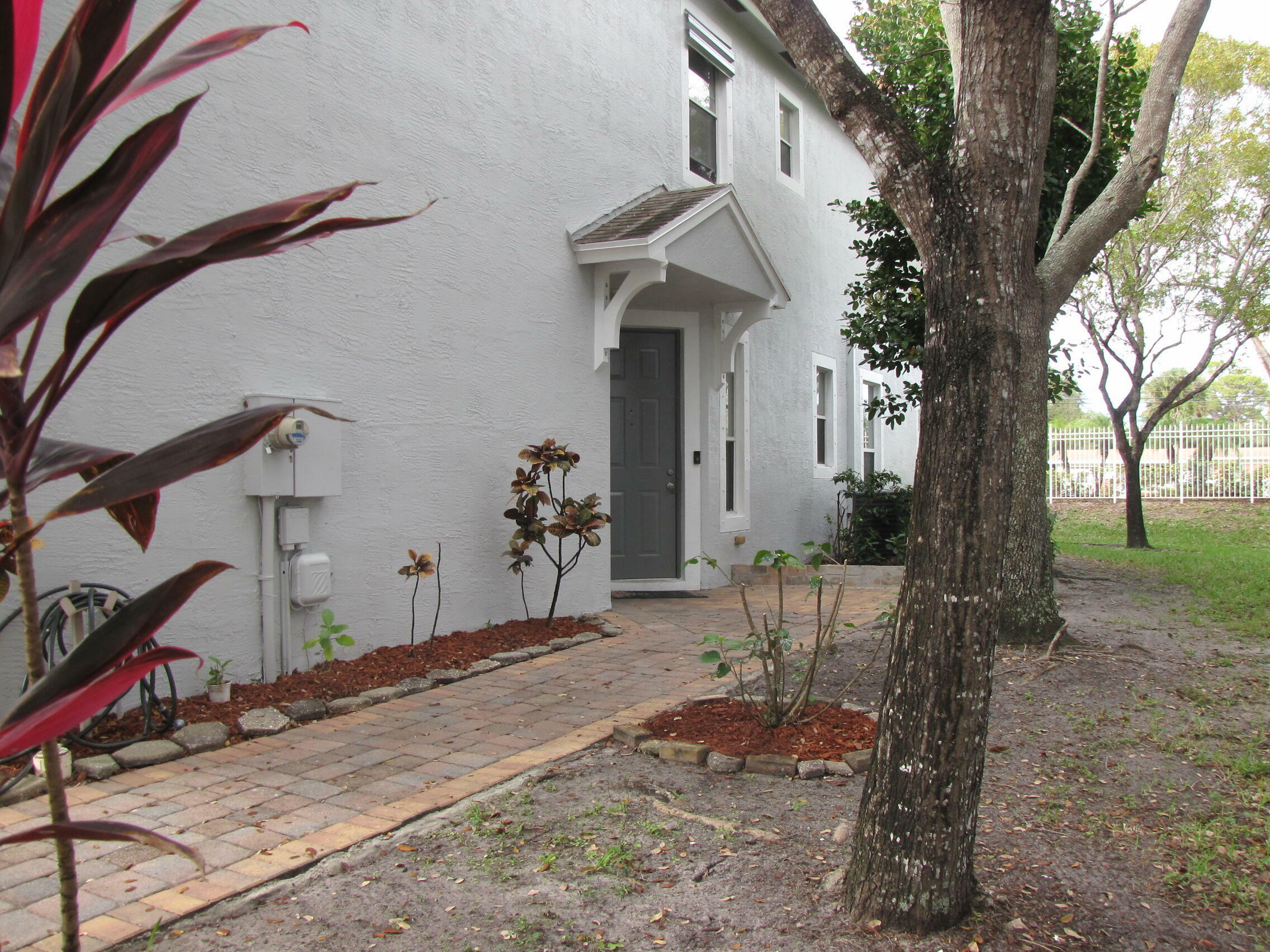 Property Photo: 5210 White Oleander FL 33415