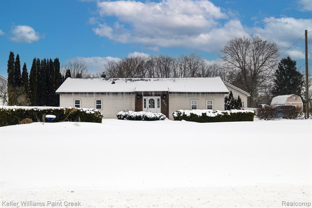 Property Photo:  635 Joslyn Road  MI 48362 2119 