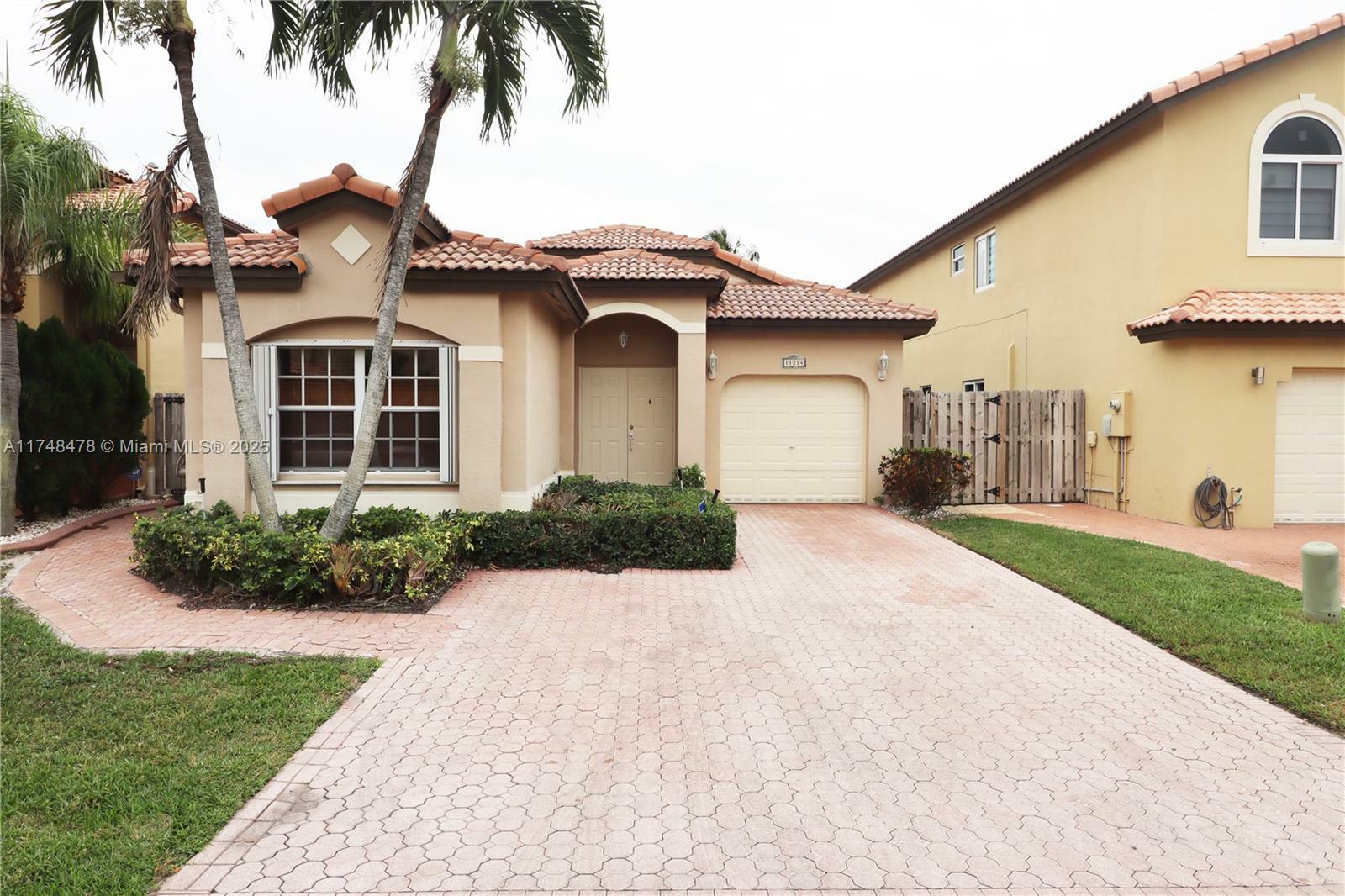 Property Photo:  11214 NW 53rd Ln -  FL 33178 