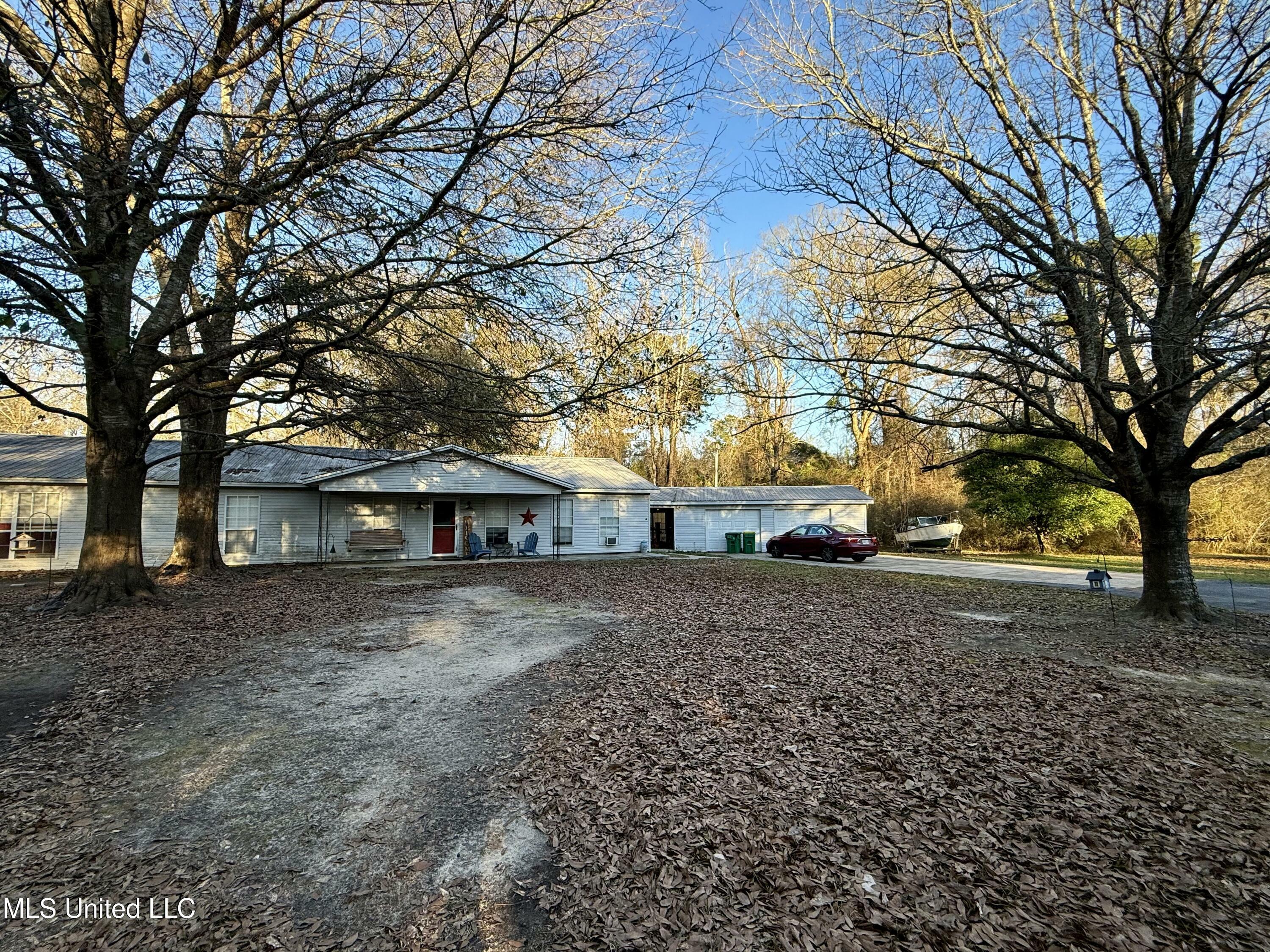 Property Photo:  15304 Old River Road  MS 39565 