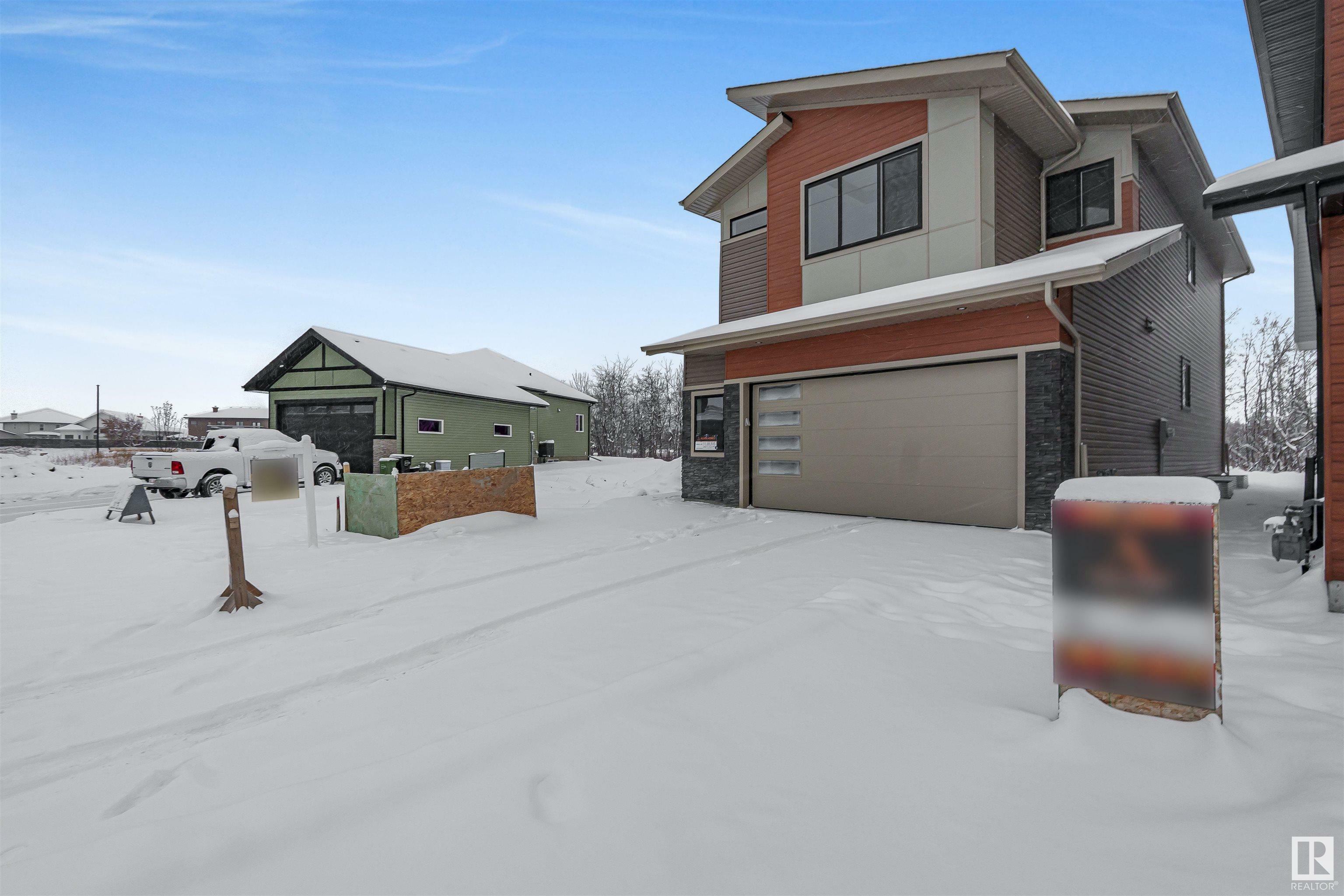 Property Photo: 244 166 Avenue NE AB T5Y 4J2