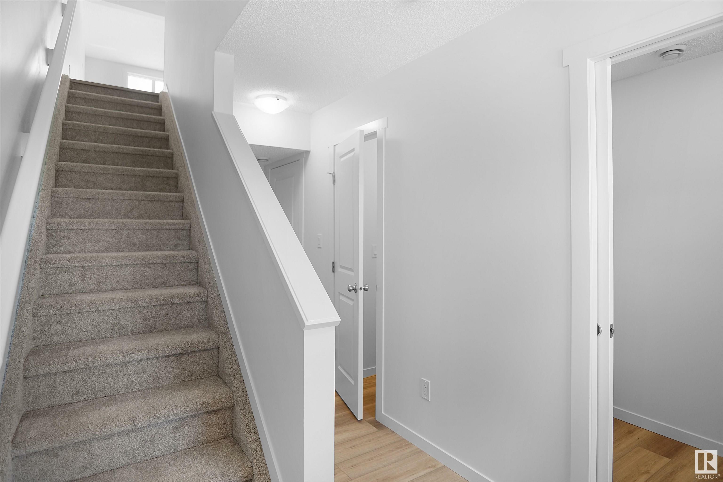 Property Photo: 1025 Secord Promenade NW 136 AB T5T 7V4