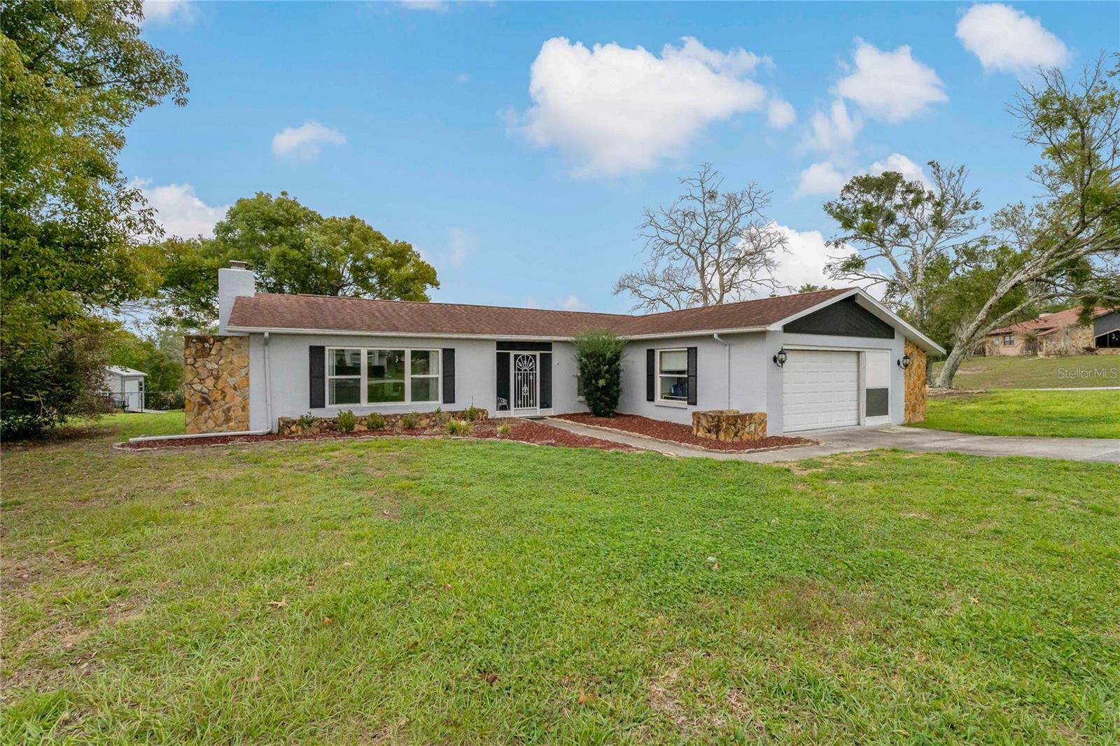 Property Photo:  10200 Sunburst Court  FL 34608 