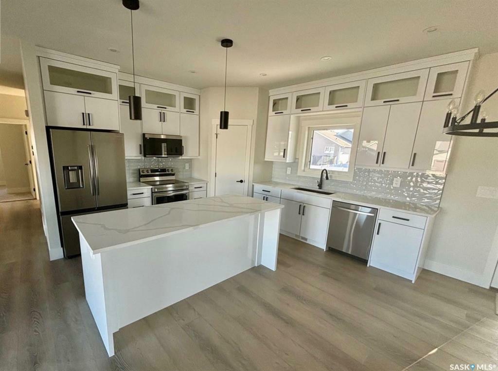 Property Photo: 730 Weir Crescent SK S0K 4S4