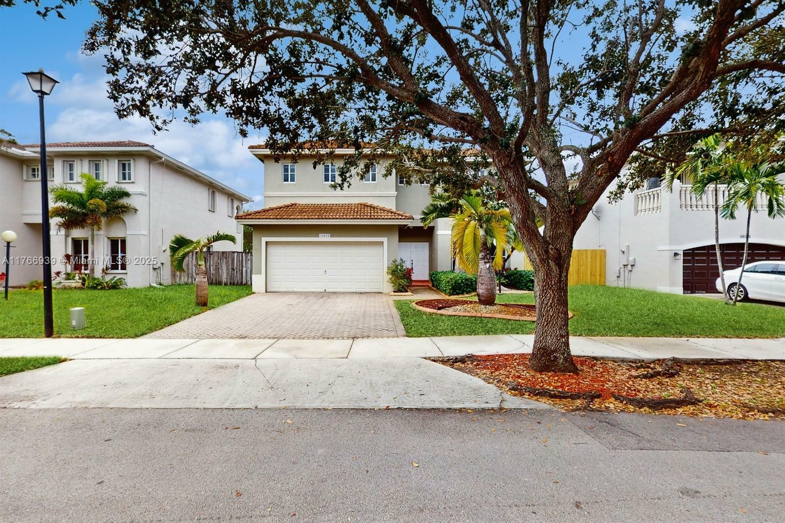 Property Photo: 14214 SW 129th Path FL 33186